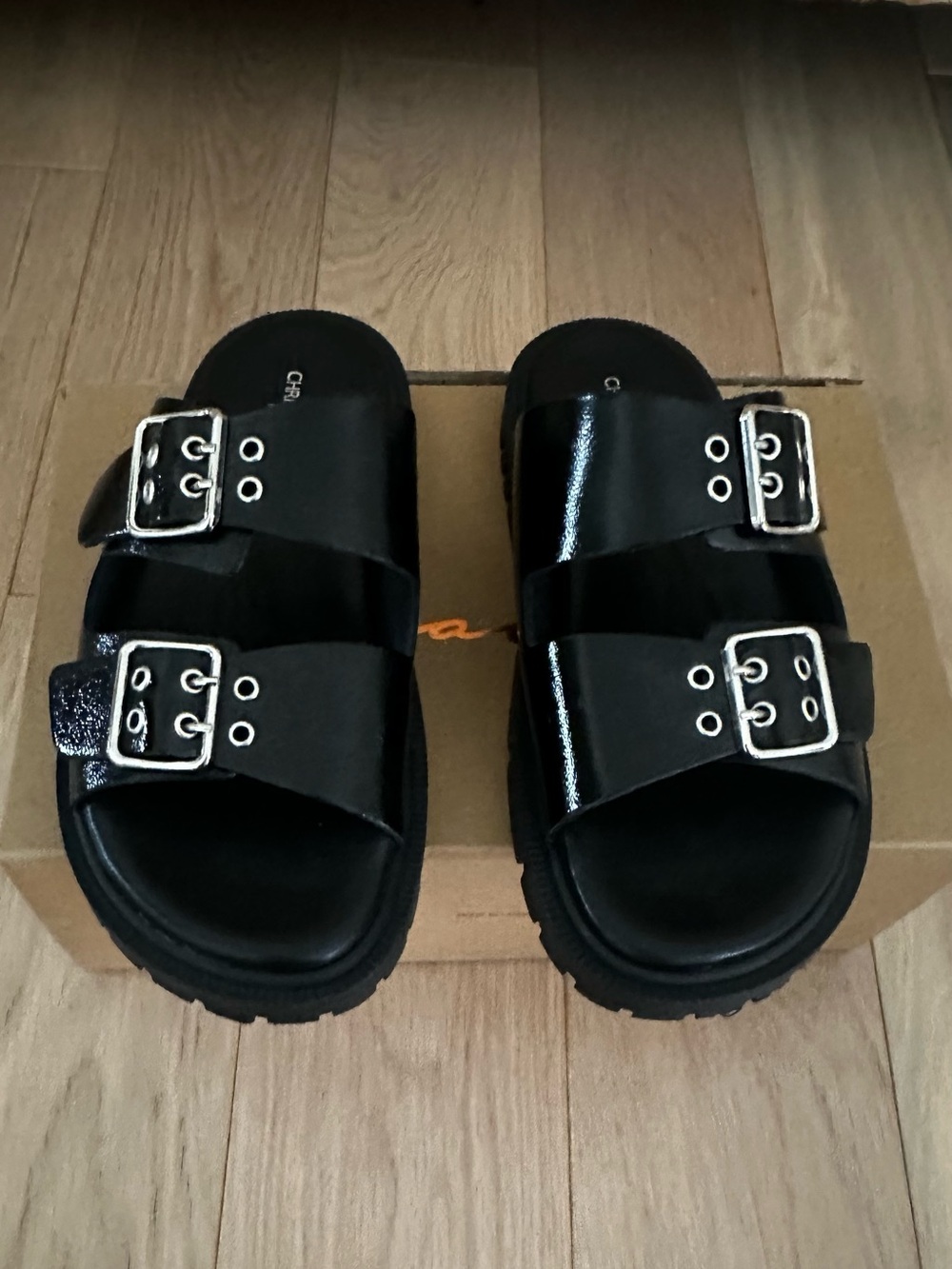 Black shiny leather sandals slides